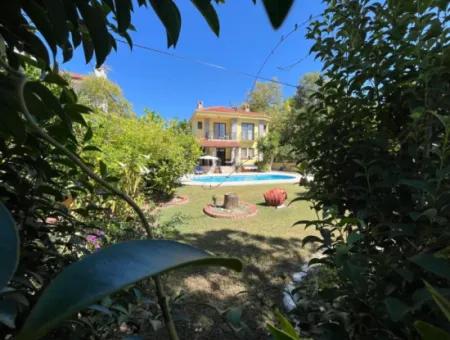 Charming Private Villa With Oval Pool, Lush Gardens, And Spacious Terraces